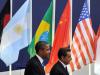 Os presidentes dos EUA, Barack Obama, e da França, Nicolas Sarkozy, durante a chegada à cúpula do G-20, em Cannes. O desafio deste ano é debater a crise econômica instaurada na zona do euro