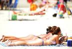 Veranistas aproveitam domingo de calor e sol em Capão da Canoa, no Litoral Norte Ronaldo Bernardi/Agência RBS