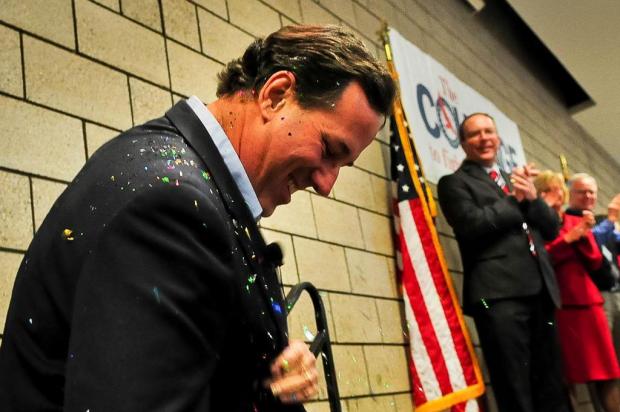 Rick Santorum supera Romney e vence prévias em três estados Ben Garvin/GETTY IMAGES/AFP