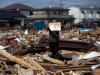 1º Lugar People in the News Stories. Após tsunami no Japão, Chieko Matsukawa mostra o diploma de formatura de filha encontrado nos escombros em Higashimatsushima