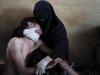 1º Lugar na categoria People in the News Singles. Mulher coberta por burka abraça parente ferido no Iêmen
