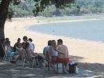 Praias e parques ficam lotados em domingo de calor