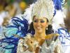 Conduzindo o coração da escola Portela, a rainha de bateria Sheron Menezzes tocou agogo na Sapucaí