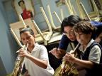 Música clássica promove inclusão social de crianças pobres na Venezuela Meridith Kohut/NYTNS Música clássica promove inclusão social de crianças pobres na Venezuela Meridith Kohut/NYTNS