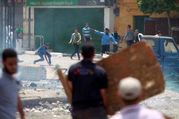 Vinte morrem em confrontos no Cairo a poucas semanas das eleições Khaled Desouki/AFP Vinte morrem em confrontos no Cairo a poucas semanas das eleições Khaled Desouki/AFP