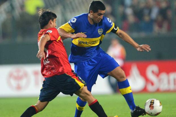 Riquelme comanda classificação do Boca Juniors às quartas da Libertadores MARTIN BERNETTI/AFP/ Riquelme comanda classificação do Boca Juniors às quartas da Libertadores MARTIN BERNETTI/AFP/