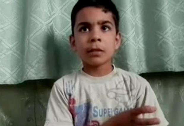 Criança de 11 anos conta como sobreviveu a massacre de Houla, na Síria AP/AP