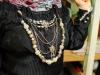 Os trajes oficiais, que continuam sendo usados pelos grupos folclóricos, são compridos, com tecidos mais pesados. As joias são usadas como forma de mostrar a riqueza da família e o preto é vestido pelas casadas, significa seriedade    