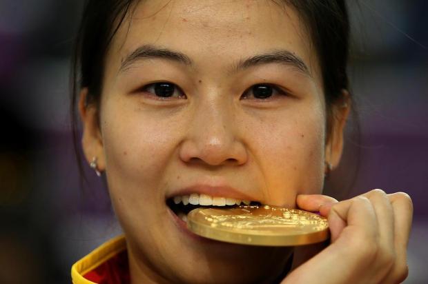 Chinesa ganha primeiro ouro dos Jogos de Londres MARWAN NAAMANI/AFP Chinesa ganha primeiro ouro dos Jogos de Londres MARWAN NAAMANI/AFP