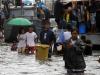 A tempestade já se afasta de Manila, capital das Filipinas, mas ainda chovia e ventava no local na manhã desta quarta-feira
