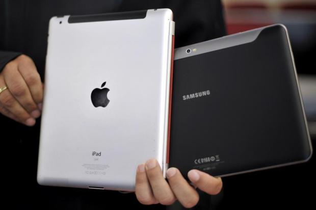 Justiça americana rejeita novo julgamento Apple-Samsung por patentes Sascha Schuermann/AP Justiça americana rejeita novo julgamento Apple-Samsung por patentes Sascha Schuermann/AP