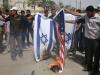 As bandeiras de Israel e dos Estados Unidos foram queimadas em protesto no Iraque