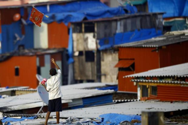 Índia começa a distribuir seu Bolsa Família Rafiq Maqbool/AP Índia começa a distribuir seu Bolsa Família Rafiq Maqbool/AP