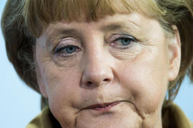 Para Merkel, será difícil fechar acordo de resgate para Chipre Markus Schreiber/AP Para Merkel, será difícil fechar acordo de resgate para Chipre Markus Schreiber/AP