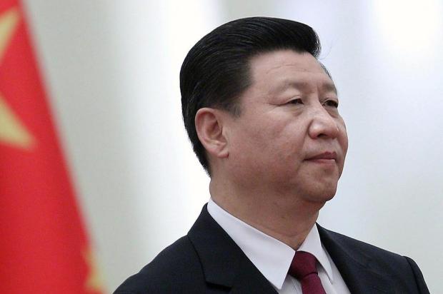 PC chinês encerra congresso reunido em torno de Xi Jinping FENG LI/AFP PC chinês encerra congresso reunido em torno de Xi Jinping FENG LI/AFP