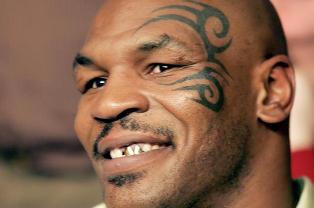 Mike Tyson revela que pegou sua ex-mulher na cama com Brad Pitt Divulgação/ Mike Tyson revela que pegou sua ex-mulher na cama com Brad Pitt Divulgação/