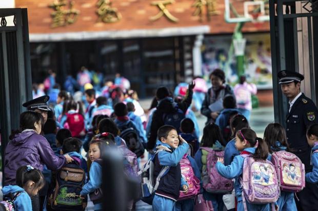 Suborno e nepotismo são práticas comuns em escolas chinesas Sim Chi Yin/NYTNS