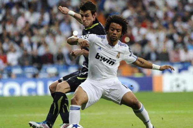 Real Madrid cogita emprestar Coentrão para investir em Gareth Bale AFP PHOTO/ PIERRE -PHILIPPE MARCOU/ Real Madrid cogita emprestar Coentrão para investir em Gareth Bale AFP PHOTO/ PIERRE -PHILIPPE MARCOU/
