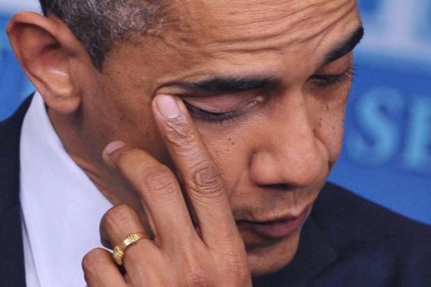 Obama chora em pronunciamento: "Nossos corações estão despedaçados" Mandel Ngan,AFP/