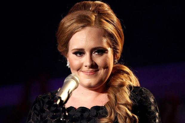 'Someone Like You', da Adele, é eleita a música mais popular do ano em karaokês  Matt Sayles/AP