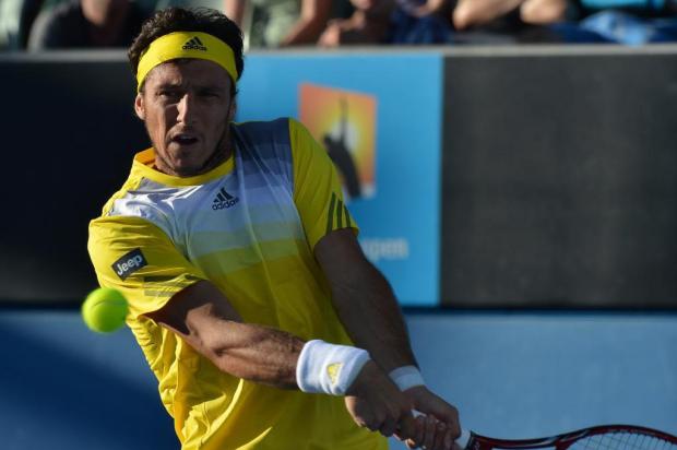 Juan Monaco perde para russo e dá adeus ao Aberto da Austrália PAUL CROCK/AFP Juan Monaco perde para russo e dá adeus ao Aberto da Austrália PAUL CROCK/AFP
