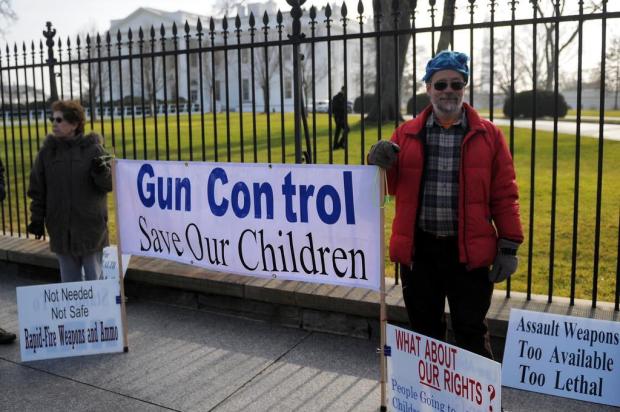 Barack Obama acena com veto a rifles /Jewel Samad/AFP PHOTO
