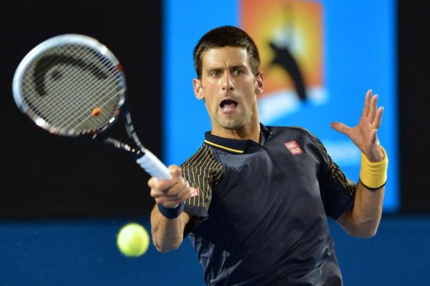 Djokovic vence Ryan Harrison sem dificuldade no Aberto da Austrália PAUL CROCK/AFP