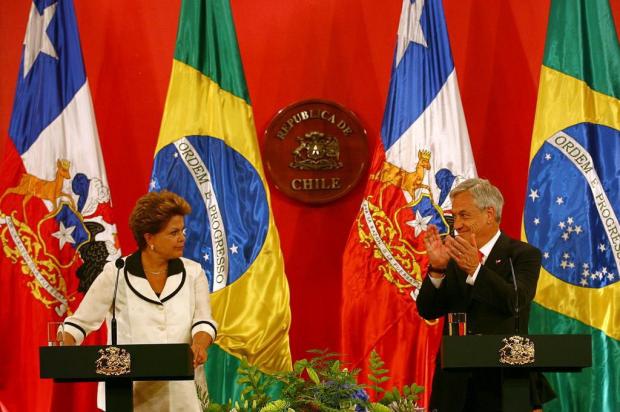 Dilma afirma que Brasil quer ampliar cooperação com o Chile Geraldo Caso/AFP Dilma afirma que Brasil quer ampliar cooperação com o Chile Geraldo Caso/AFP