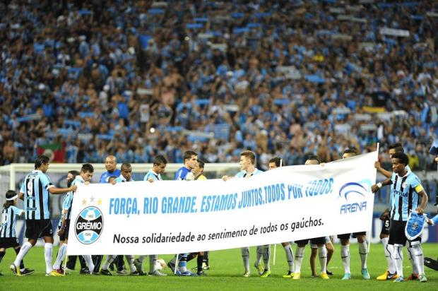 Pré-jogo de Grêmio x LDU é marcado por homenagens às vítimas de Santa Maria Diego Vara/Agencia RBS