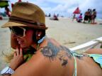 Jovens de Atlântida ilustram tendência de tatuagens maiores pelo corpo Félix Zucco/Agencia RBS