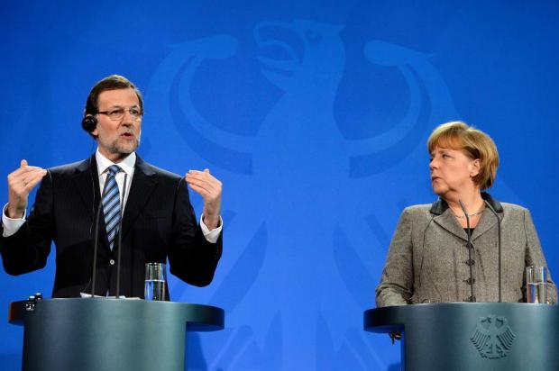 Rajoy diz em Berlim que acusações de corrupção são falsas Odd Andersen/AFP
