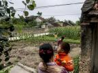 Em uma pequena vila vietnamita, as mulheres escolhem ser mães solteiras Justin Mott/IHT