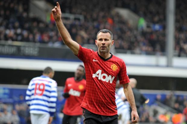 Prestes a completar marca de 1000 jogos, Giggs assina renovação com o United Olly Greenwood/ AFP/