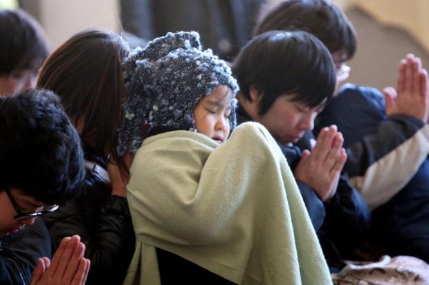 Japão relembra terremoto e tsunami que devastaram país há dois anos JIJI PRESS/AFP PHOTO