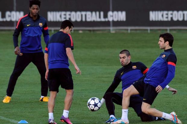 Barcelona reencontra o Milan em busca de recuperação na Liga dos Campeões Lluis Gene/AFP/