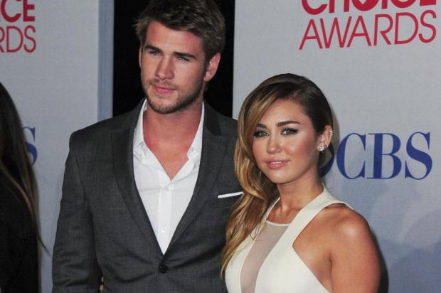 Termina noivado de Miley Cyrus e Liam Hemsworth, diz jornal Robyn Beck/AFP Termina noivado de Miley Cyrus e Liam Hemsworth, diz jornal Robyn Beck/AFP