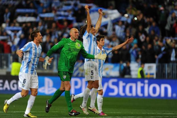 Málaga vence o Porto por 2 a 0 e está classificado para as quartas de final JORGE GUERRERO/AFP Málaga vence o Porto por 2 a 0 e está classificado para as quartas de final JORGE GUERRERO/AFP
