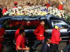 Caixão de Chávez percorre Caracas pela última vez Geraldo Caso/AFP Caixão de Chávez percorre Caracas pela última vez Geraldo Caso/AFP