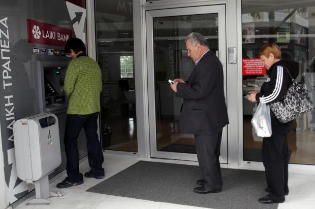 Presidente cipriota diz que Parlamento rejeitará pacote YIANNIS KOURTOGLOU/AFP Presidente cipriota diz que Parlamento rejeitará pacote YIANNIS KOURTOGLOU/AFP