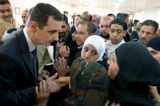 Presidente sírio faz visita surpresa a centro educacional em Damasco SYRIAN PRESIDENCY MEDIA OFFICE/AFP