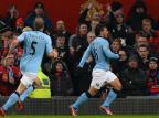 Manchester City derrota rival United com golaço de Agüero em Old Trafford Paul Ellis/AFP Manchester City derrota rival United com golaço de Agüero em Old Trafford Paul Ellis/AFP