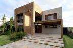 Paisagismo despojado e clean valoriza arquitetura contemporânea em casa de lazer em Atlântida (André Bastian/Divulgação)