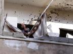 Foguetes atingem sul de Beirute ANWAR AMRO/AFP Foguetes atingem sul de Beirute ANWAR AMRO/AFP