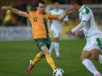 Austrália vence o Iraque no fim e se garante na Copa do Mundo de 2014 GREG WOOD / AFP/ Austrália vence o Iraque no fim e se garante na Copa do Mundo de 2014 GREG WOOD / AFP/