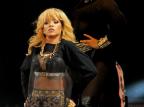 Rihanna é flagrada batendo em fã com microfone em show; assista ao vídeo Geoff Caddick/AFP