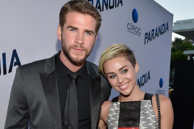 Liam Hemsworth e Miley Cyrus aparecem juntos e afastam rumores de fim do noivado Frazer Harrison/AFP