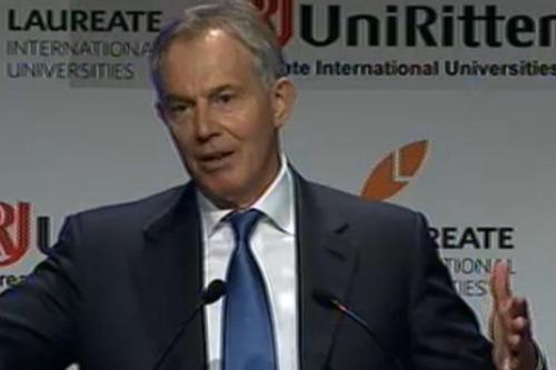 Em Porto Alegre, Tony Blair elogia cidade e diz: "Com um grande time de futebol, o Grêmio" Reprodução/TV COM Em Porto Alegre, Tony Blair elogia cidade e diz: "Com um grande time de futebol, o Grêmio" Reprodução/TV COM