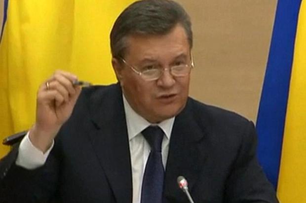 Yanukovytch diz que se viu obrigado a sair da Ucrânia por ameacas AFP PHOTO/AFP
