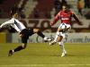 Guiñazu disputa a bola com garra