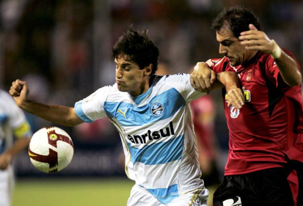 Jogadores do Grêmio comemoram empate em Caracas Fernando Llano, AP/
